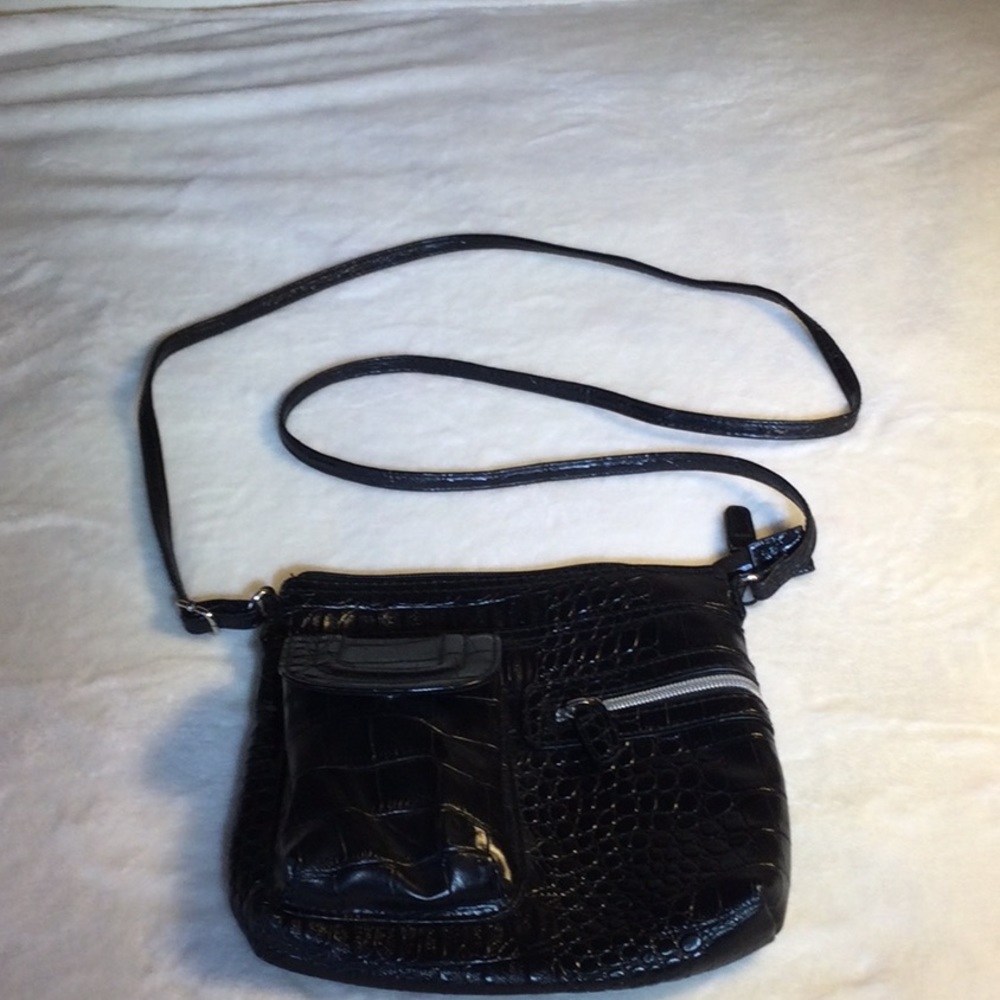 Small faux leather black bag with shoulder strap and compartments